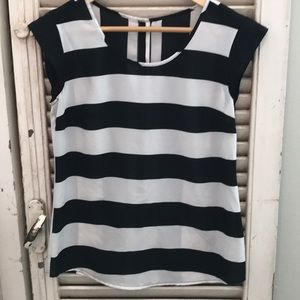The limited Black and white stripped blouse